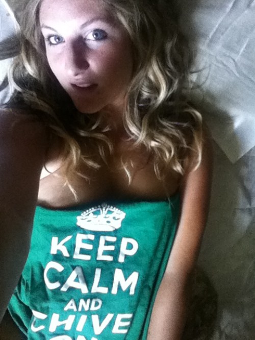 Pretty blonde with gray eyes and perky supple boobs takes selfie in green KCCO top