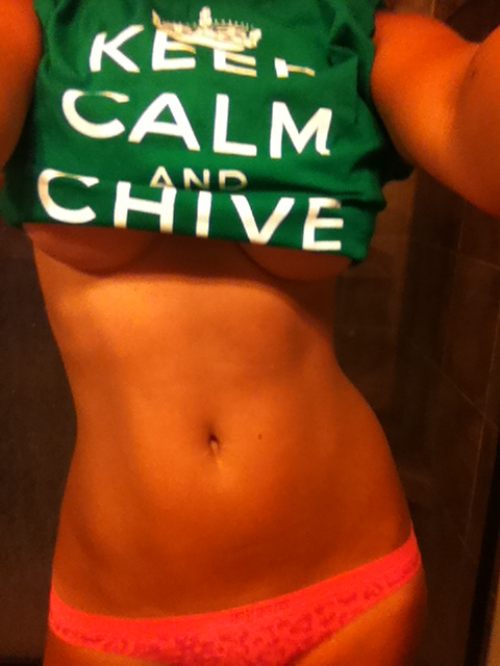 Girl with flat abs and curvy hot sexy body takes selfie in red panties and underboobs showing green KCCO top