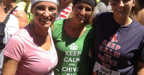 girls in keep calm shirts running a race or marathon with black face paint