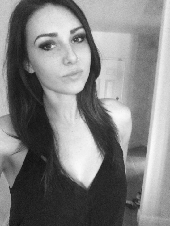black and white selfie of girl in black top