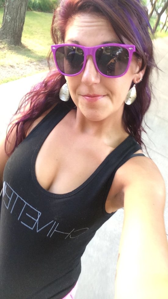 girl in chivette tank with purple sunglasses