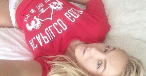 Blonde selfie girl in red shirt