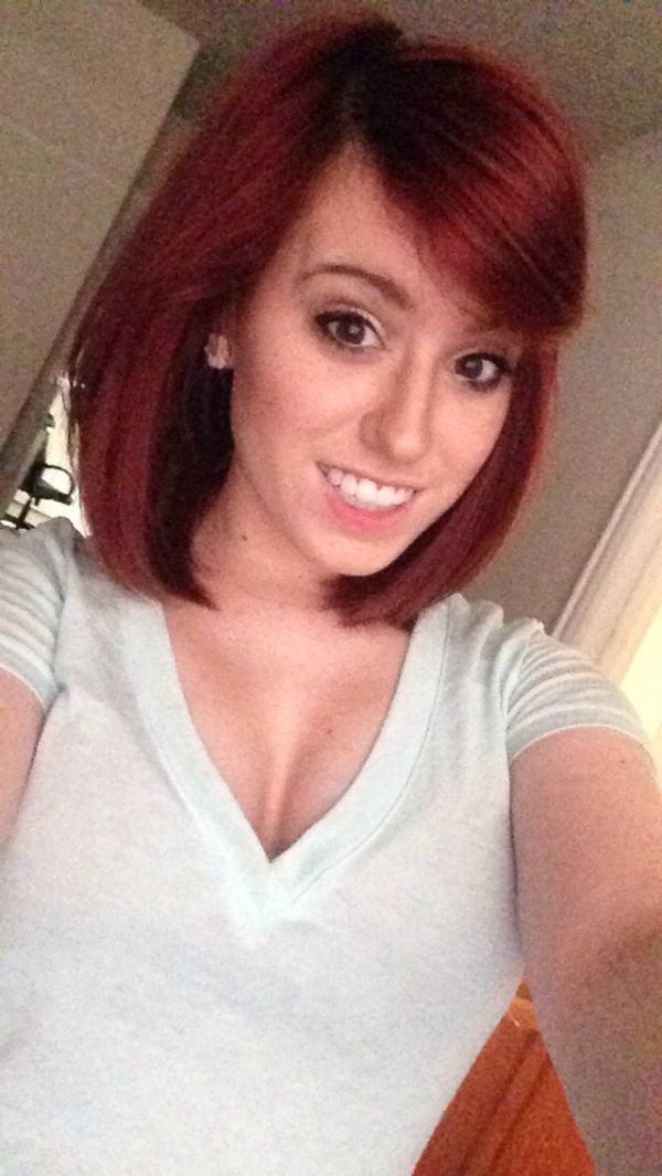 Redhead girl with white shirt