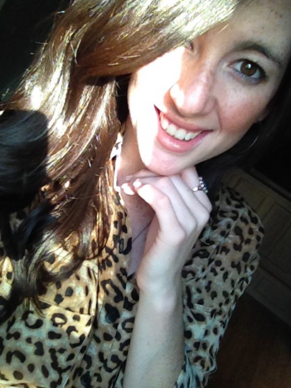 Girl smiling with cheetah shirt