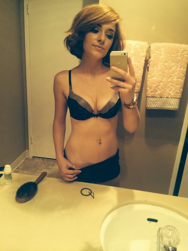 Girl in black bra in mirror