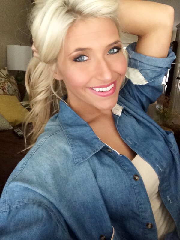 Blonde girl selfie in jean shirt