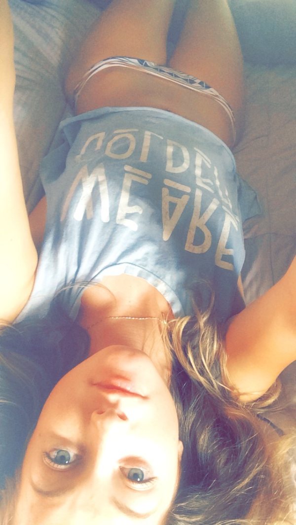 Selfie girl in panties on bed