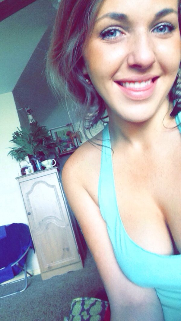 Girl selfie in blue tank top
