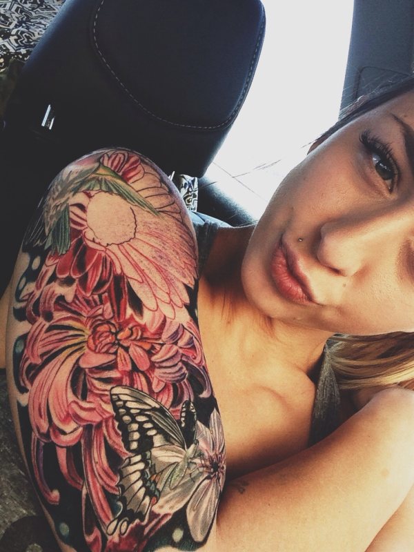 Selfie girl with tattoo sleeve