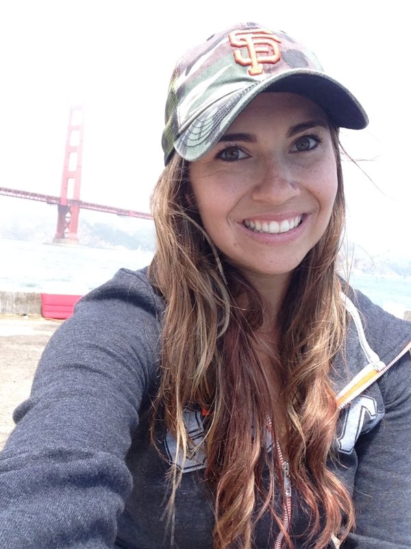 Girl selfie in hat by golden gate bridge