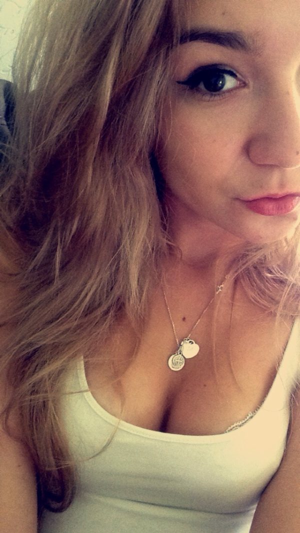 Selfie girl in white tank top