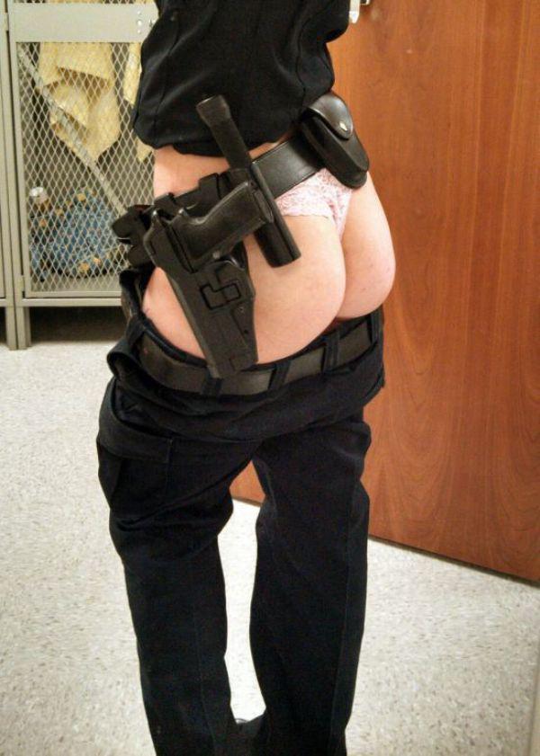 Girl with slim sexy body in black cop uniform lowers pants to flaunt perky juicy butt cheeks in white lace panties
