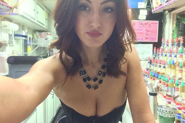 gorgeous woman poses to click sexy boobs selfie to show her lovely black diamond necklace