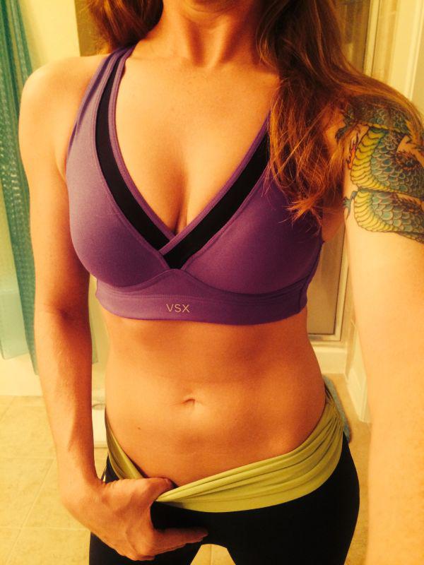 Sexy babe showcases her sexy abs, wearing purple VSX top