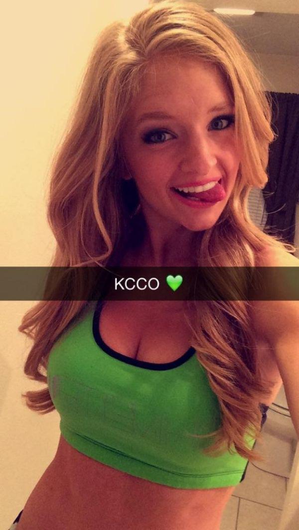 Cute girl wearing green top, poses for the camera with the words 'KCCO' in the foreground