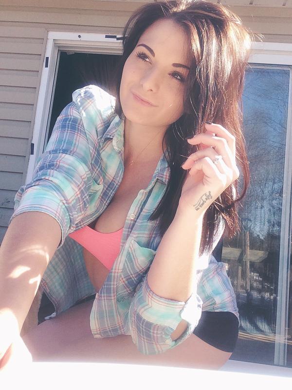 Beautiful babe takes a pose during sunny day