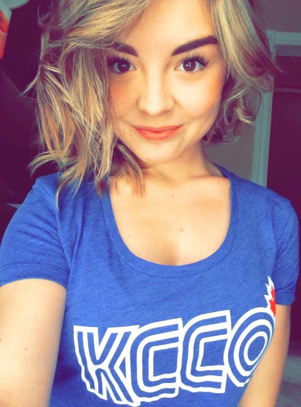 Gorgeous babe takes her selfie wearing KCCO printed blue top