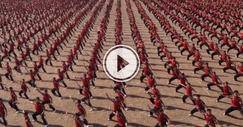 36,000 Kids from the Shaolin Temple Kung Fu Academy performing something amazing .