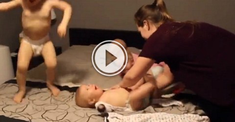 Just changing four kids at once, no big deal (Video)