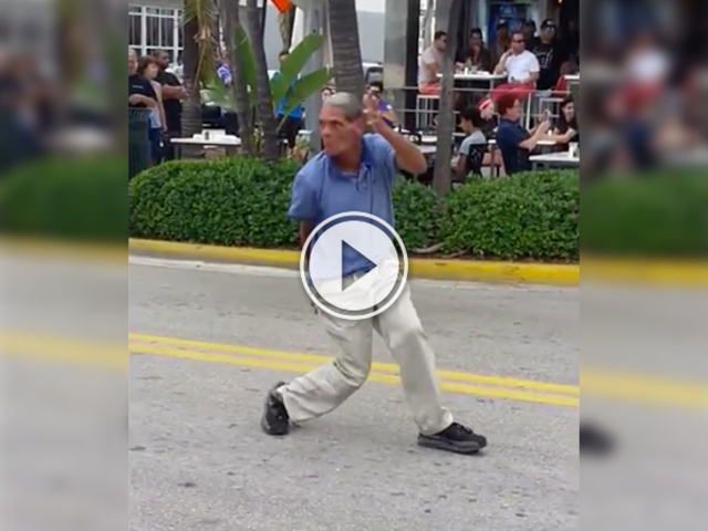 Guy dancing on drugs in the street