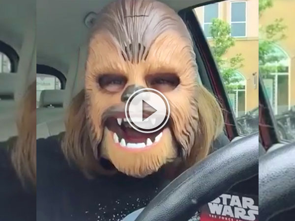 Adorably excited lady can’t handle a Chewbacca mask