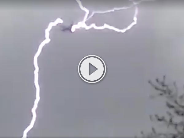 Lighting strike hits a plane, and this dude captures it. Scary stuff!! (Video)