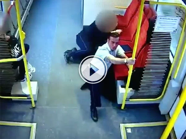 Train Driver runs through train warning passengers (Video)