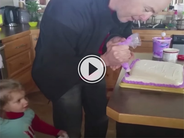 Video of dad preparing a cake.