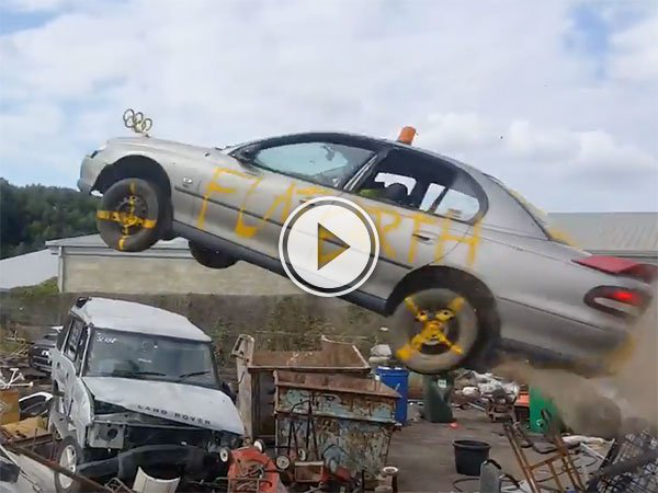 Car jumps trash in Australian junkyard (Video)