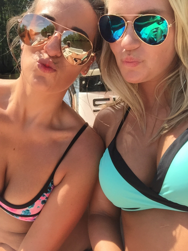 Hot bikini babes with shades making sexy pouts to the camera
