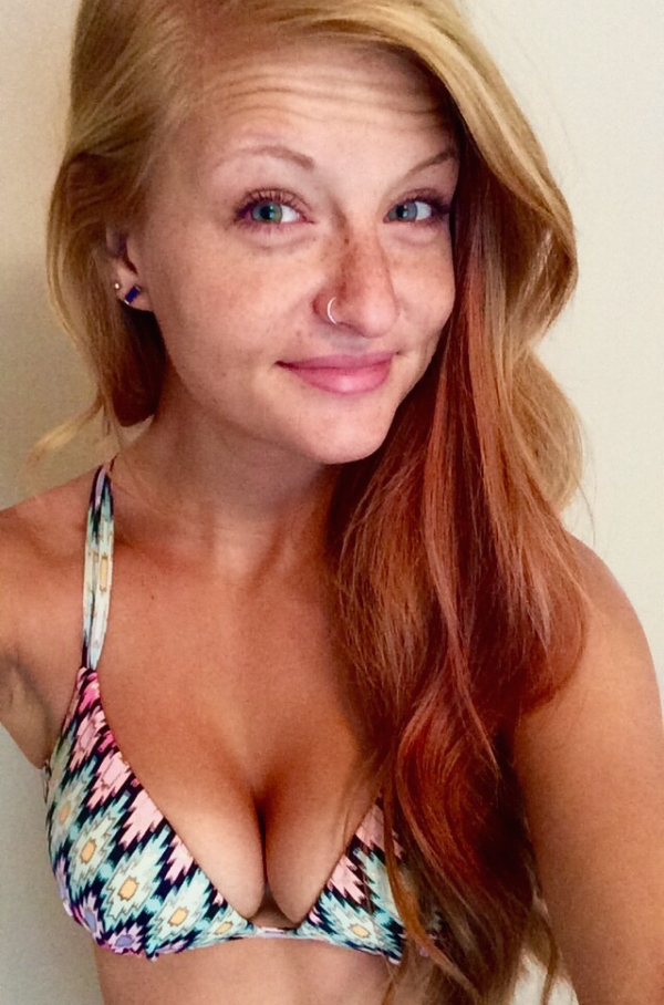 Raising an eyebrow for the selfie with a textured bikini and nose ring