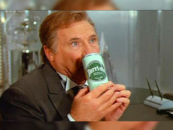 A scene from movie spaceballs where President Skroob breathes in air from a can!