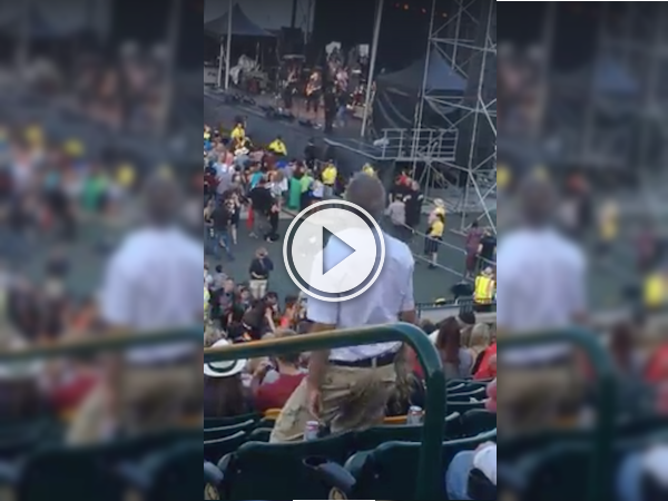 Looks like dad brought his best moves to the concert! (Video)