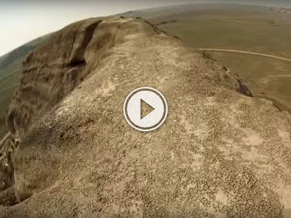 Sask. daredevil rides a unicycle across a metre high ridge, for fun! (Video)