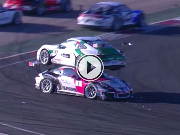 Porsche Carrera rally crash ends with car on top of other (Video)