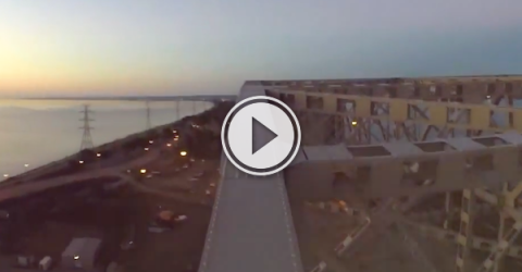 Dude climbs up the Skyway bridge in Burlington, like it's no big deal (Video)