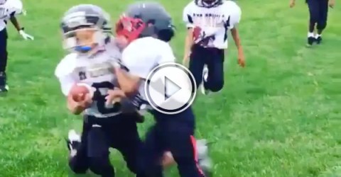 Ouch, kid gets sacked by his own teammate! (Video)