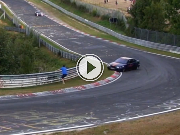 Guy almost gets run over by car (Video)