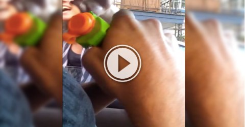 Road rager has a gun pulled on them - a squirt gun! (Video)