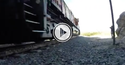 Dudes assume a train tunnel is abandoned. They're wrong! (Video)