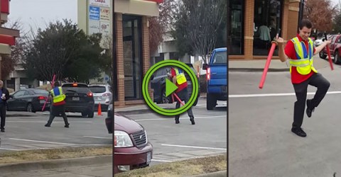Parking attendant uses batons like lightsabers (Video)