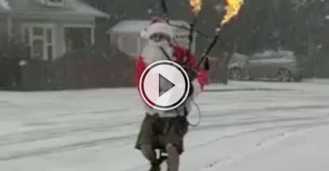 Santa riding a unicycle and playing a flaming bagpipe to the GOT theme