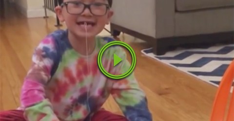 Little daredevil pulls tooth with hot wheels car
