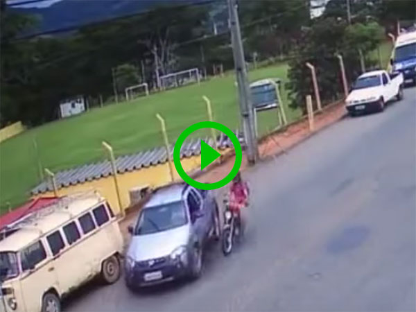 Motorcyclist has dramatic crash with car (Video)