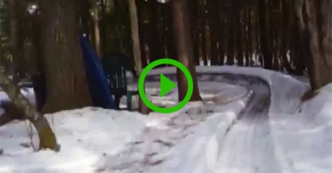 Guy builds epic ice slide in backyard (Video)