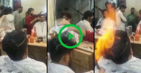 Guy in India use fire to cut hair (Video)