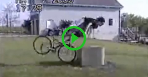 Guy rides full speed into metal box and flys off his bike