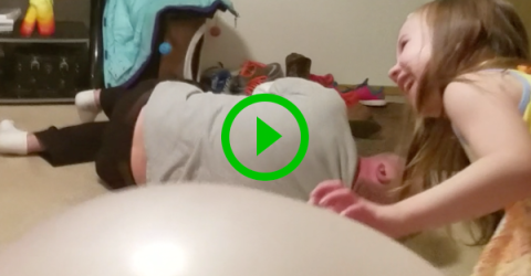 Dad sinks through large inflated balls in painful fail (Video)