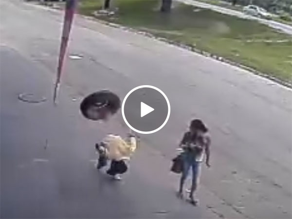 Man hit in head by tyre in freak accident (Video)