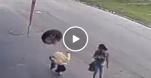 Man hit in head by tyre in freak accident (Video)